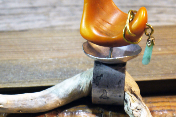 Adjustable base metal ring with orange tagua nut