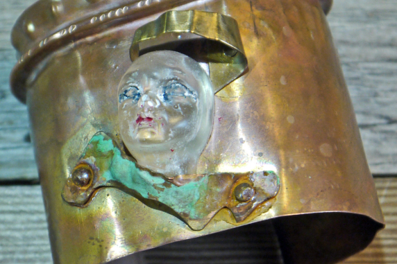 Resin face fold formed cuff bracelet with green patina