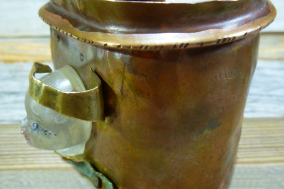 Resin face fold formed cuff bracelet with green patina