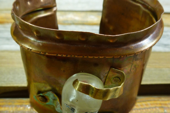 Resin face fold formed cuff bracelet with green patina