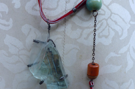Looking glass mannequin bust steel wire red suede necklace