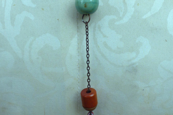 Looking glass mannequin bust steel wire red suede necklace