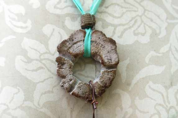 Cholla disc necklace with enameled #8 and a bottlecap accent