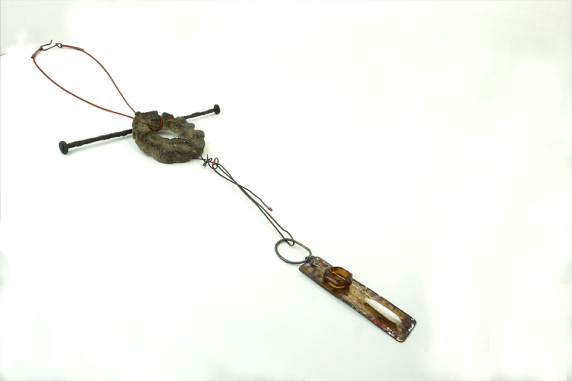 Concrete choya disc with dangling enamel charm