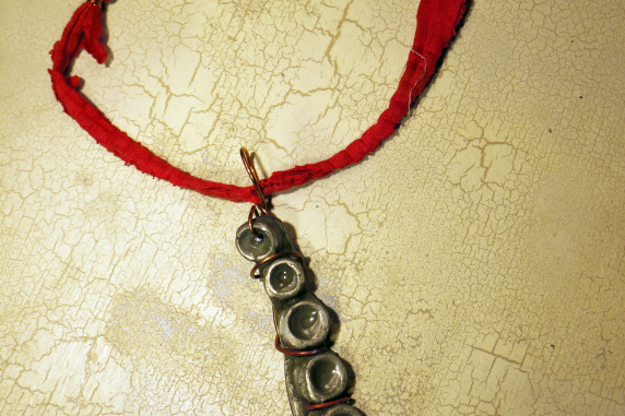 Concrete octopus necklace with recycled red cord