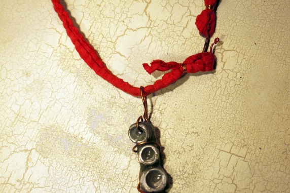 Concrete octopus necklace with recycled red cord