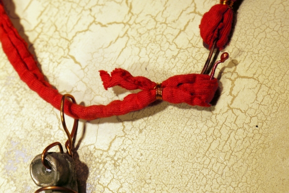 Concrete octopus necklace with recycled red cord