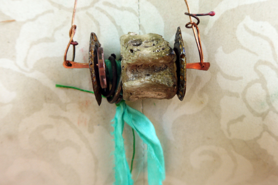 Concrete vertebrae necklace with found objects