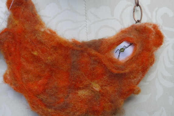 Orange felted yarn necklace with copper chain and vintage buttons
