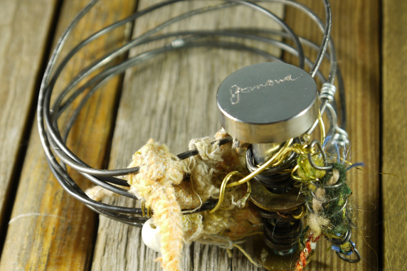 Industrial steel wire, drawer pull and yarn bracelet
