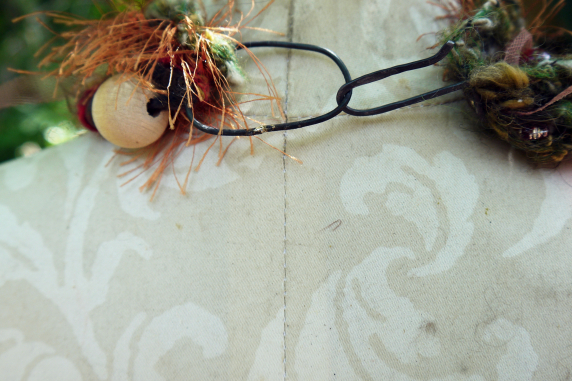 Yarn fringe mixed media charm necklace