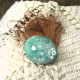 aqua colored resin skull with copper hair sustainable jewley