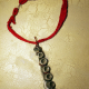 Concrete octopus necklace with recycled red cord