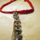 Concrete octopus necklace with recycled red cord