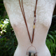 worn long Concrete vertebrae necklace with found objects