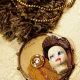 laid in resin with a rhinestone Edwardian steampunk fringe necklace with face