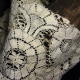 vintage lace slightly tattered Day of the Dead skully with pink flower eye