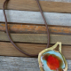 art jewelry with leather cord sustainable jewelry design