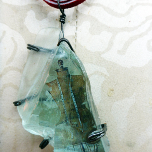 Looking glass mannequin bust steel wire red suede necklace