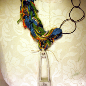 Colorful yarn and concrete safety pin necklace with steel links