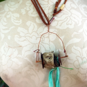 Concrete vertebrae necklace with found objects