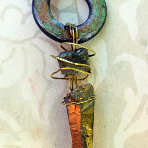 industrial necklace with turquoise cord and brass