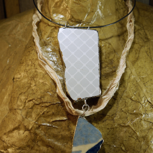 Tile remnant silver solder and steel necklace