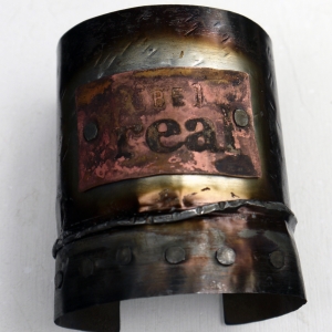 Upcycled tin can cuff bracelet with copper tag