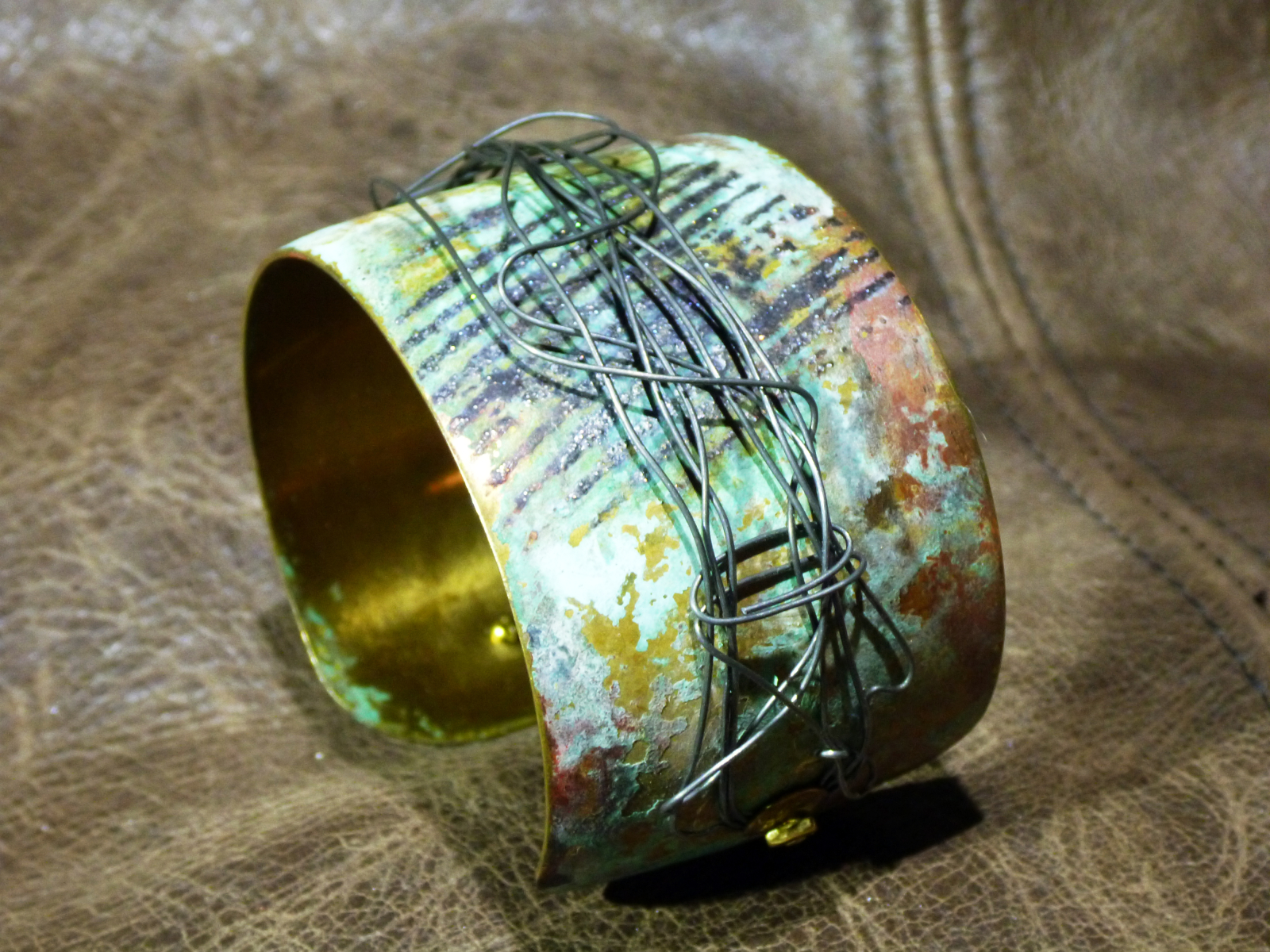 Embossed brass cuff with patina Jomama