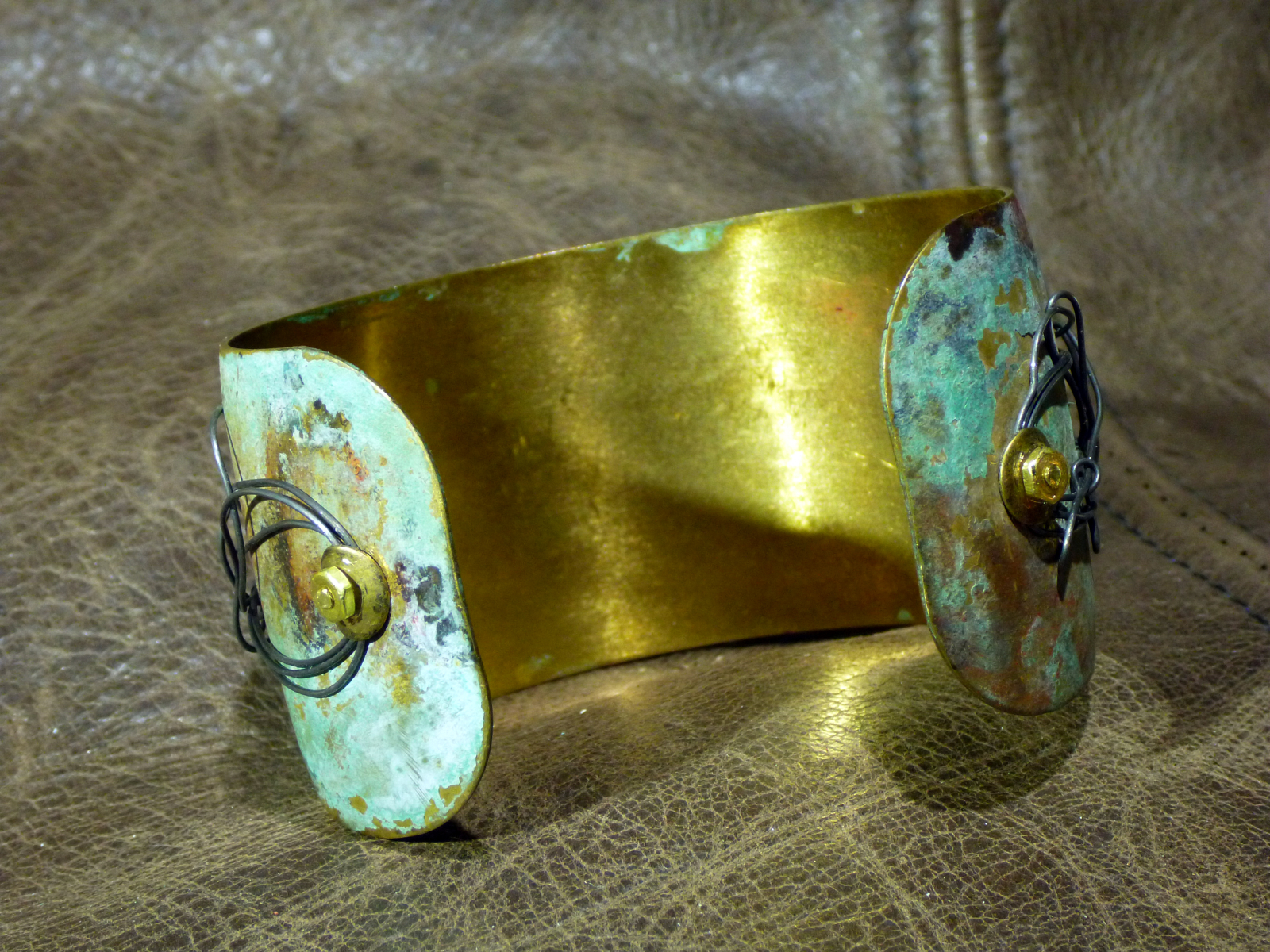 Embossed brass cuff with patina Jomama