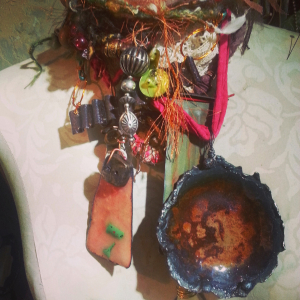 Layered necklaces made by Jomama. Boho recycled and repurposed materials including fibers, wood, metal, enamel, concrete and resin. 