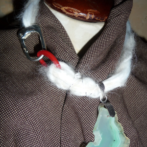 White yarn with turquoise stone